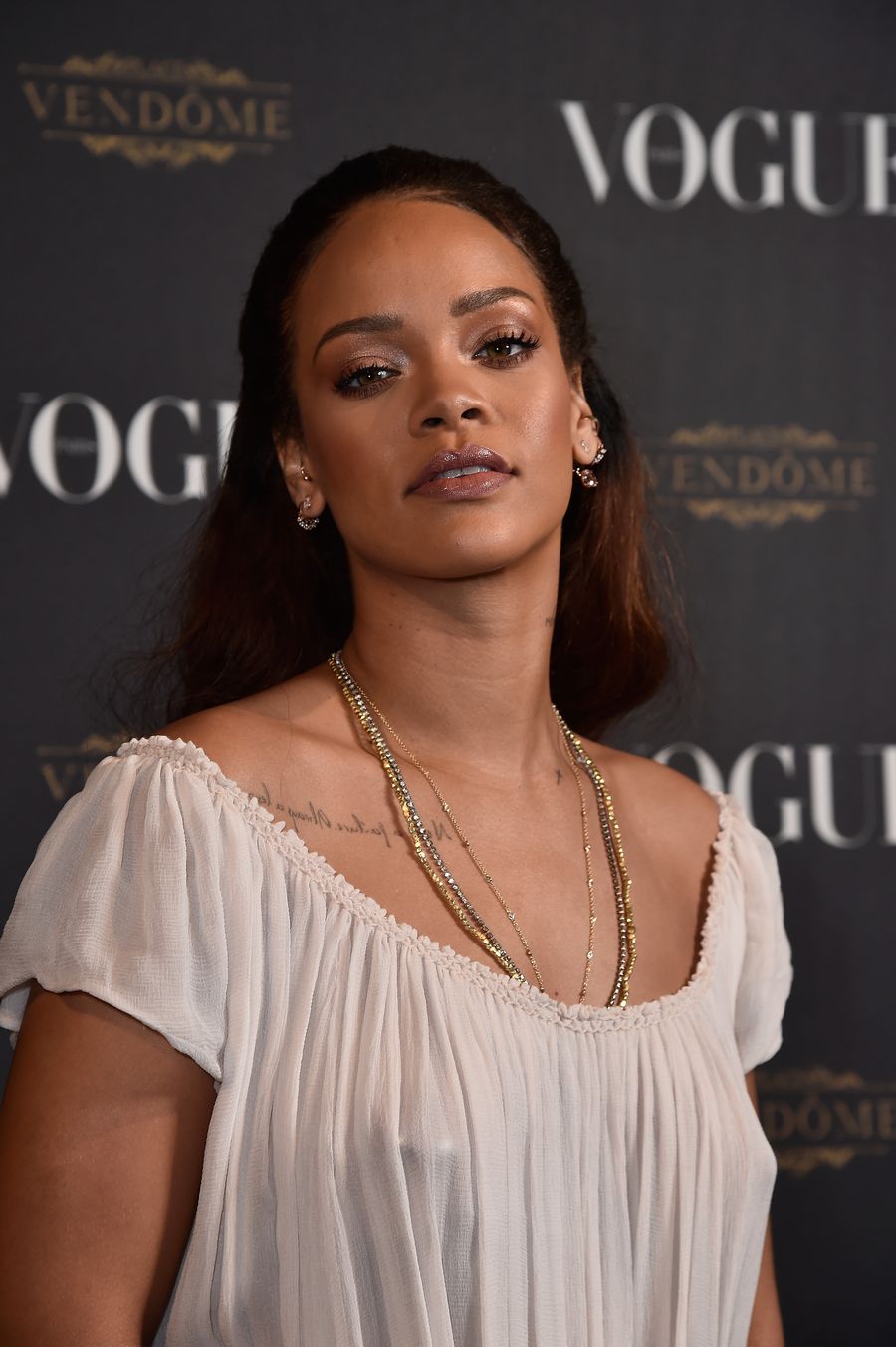 Rihanna Braless (15 Photos) 14